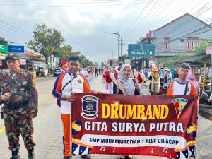 Penampilan Drumband Gita Surya Putra Meriahkan Pawai Ta’aruf Muharram 1447 H